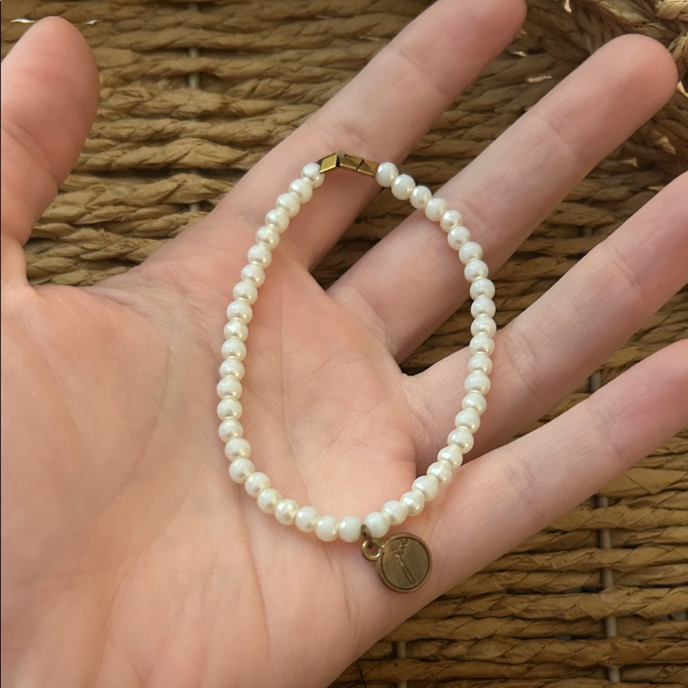 Elegant Pearl Bracelet with Gold Charm